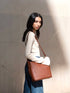<tc>Oli - Sac à bandoulière midi peau de pomme cuir marron</tc>